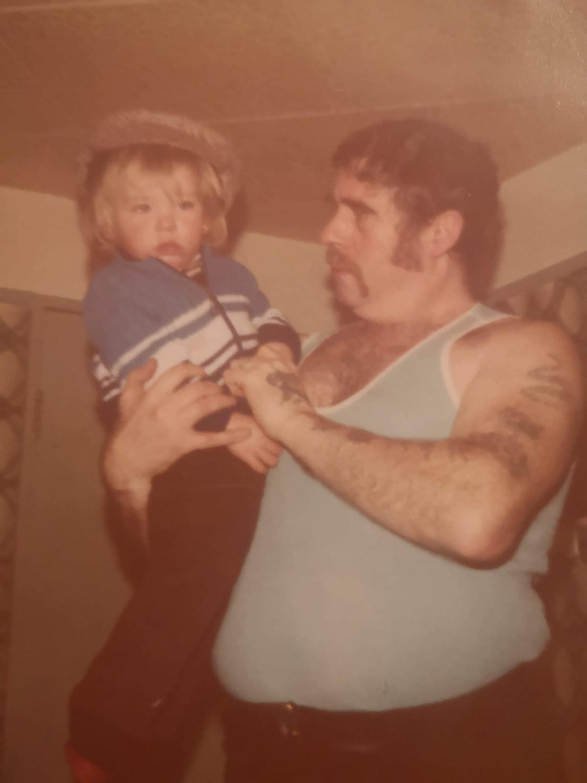 Grandad Black holding young Ben